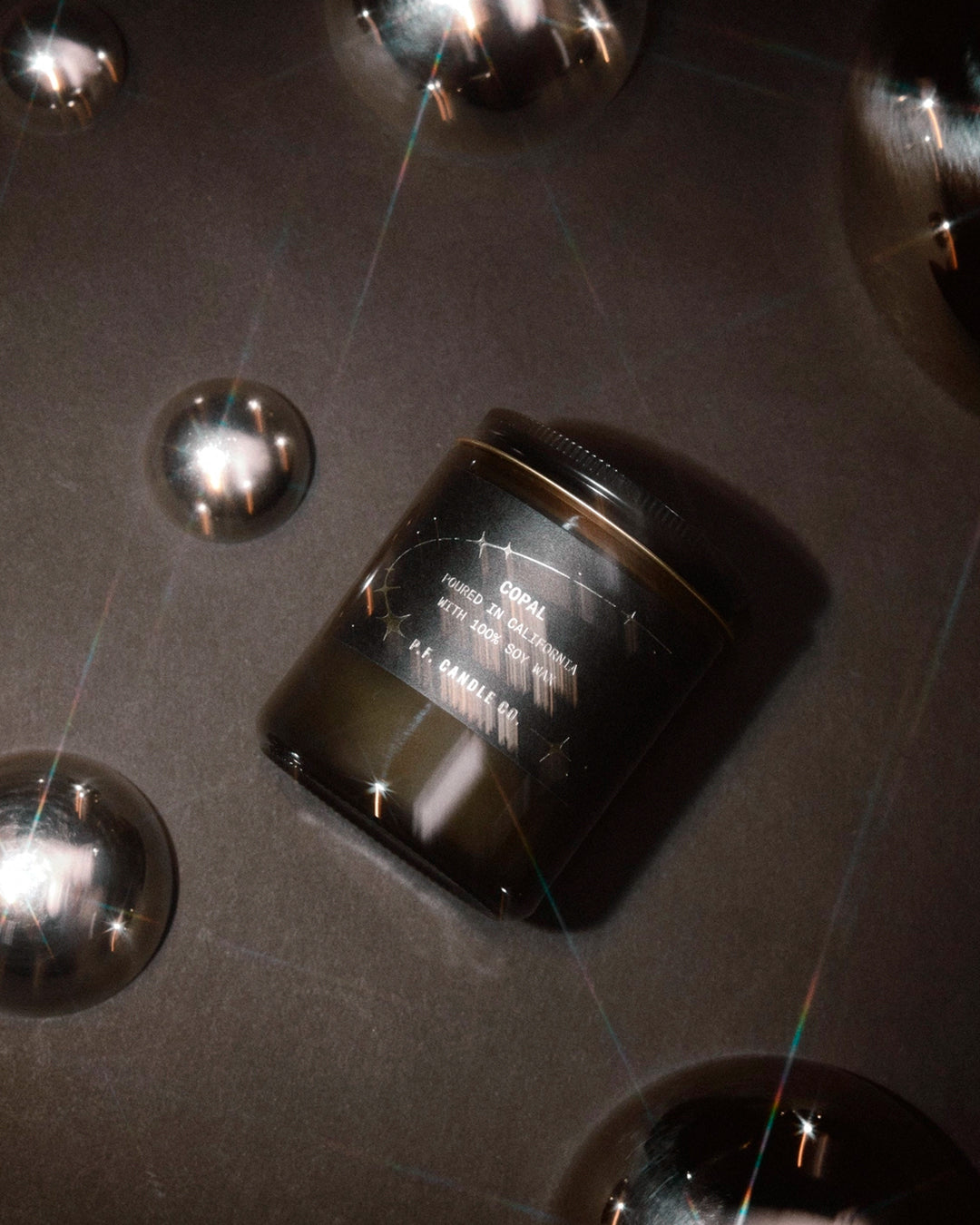 P.F. Candle Co regularly release seasonal candles alongside their core line-up and their 2026 Celestial edition candle line up is presented in smoky grey glass jars with black and silver labels.&nbsp;