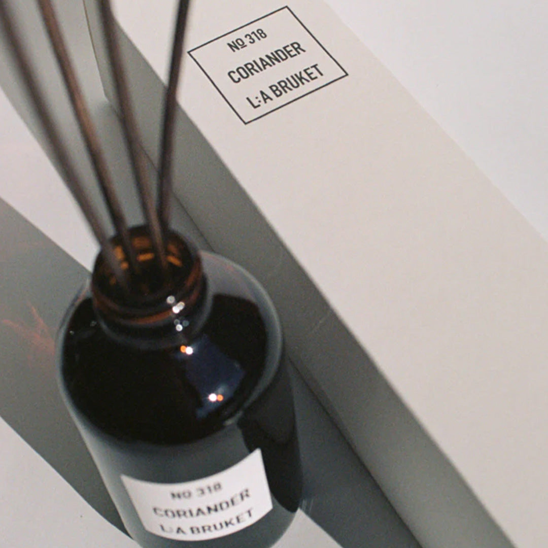 A wonderful room diffuser with a fresh scent of coriander and mint leaves from&nbsp;L:A Bruket, presented in an amber glass bottle with natural rattan reed sticks.A wonderful room diffuser with a fresh scent of coriander and mint leaves from&nbsp;L:A Bruket, presented in an amber glass bottle with natural rattan reed sticks.
