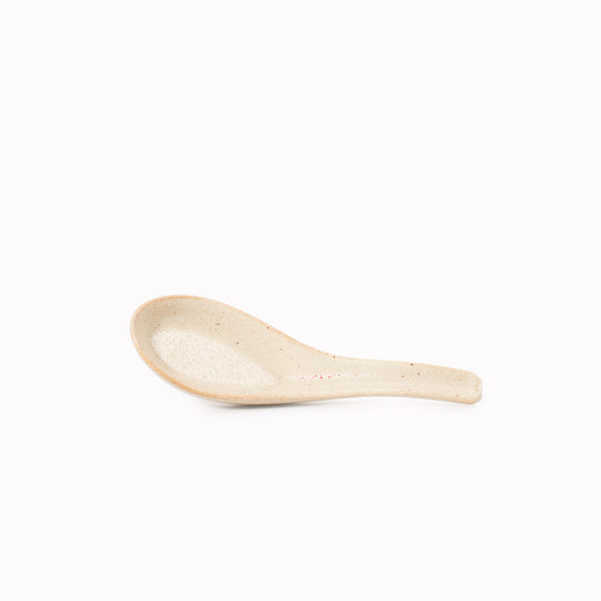 Japanese soup spoon in a soft speckled cream glaze, made of 'Minoyaki' porcelain, fired at a high temperature and hand finished in Gifu prefecture, Japan.