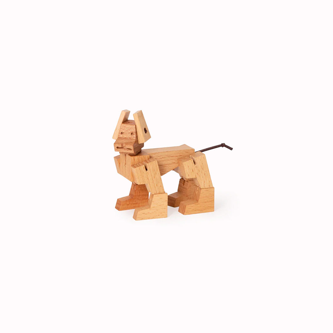 Cubebot is a fun wooden toy dog that folds out of a perfect cube shape.  Part puzzle, part posable toy they are inspired by Japanese Shinto Kumi-ki puzzles and can be positioned to hold dozens of poses. 
