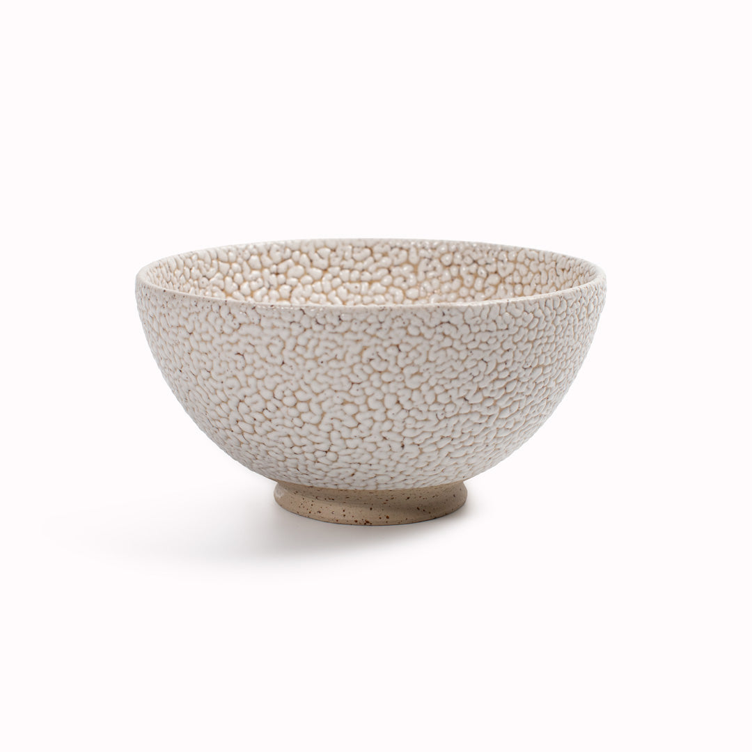 Danish Designers Studio Arhoj are renowned for their unique and colourful ceramics and the Curdle Spring Bowl with textured white glaze is no exception - Main
