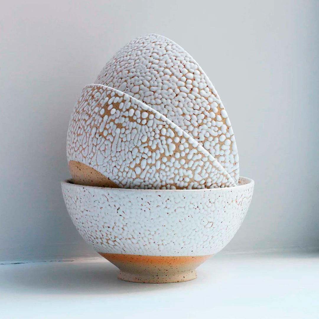 Danish Designers Studio Arhoj are renowned for their unique and colourful ceramics and the Curdle Spring Bowl with textured white glaze is no exception - collection