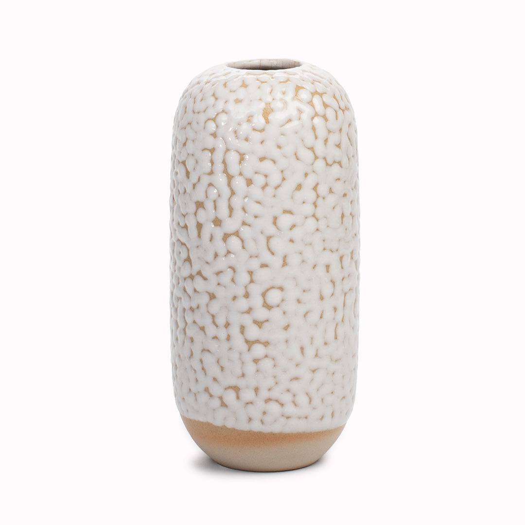 Studio Arhoj's Japanese inspired vases are named after the Japanese word for snow. The knobbly glazed Curdle design is hand-thrown in watertight stoneware. Due to the rounded taper at the top of the vase