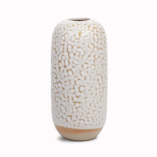 Studio Arhoj's Japanese inspired vases are named after the Japanese word for snow. The knobbly glazed Curdle design is hand-thrown in watertight stoneware. Due to the rounded taper at the top of the vase