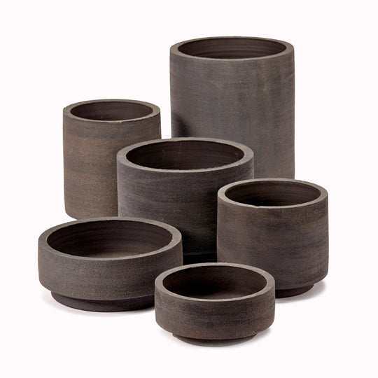 The Cylinder Pot from Serax is a beautifully crafted piece from terracotta that combines functionality with a slightly rustic aesthetic feel. Its simple proportions and shape make it a stylish addition to any indoor space.