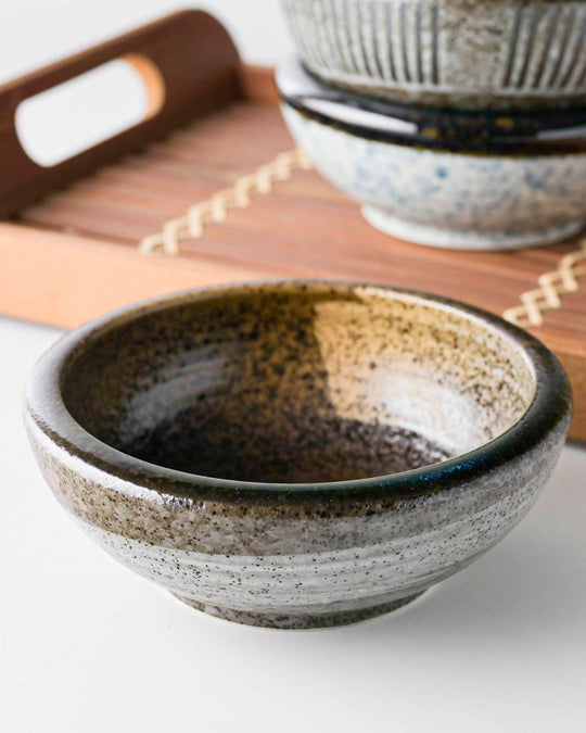 Side bowl made from Japanese ceramic, suitable for serving individual side dishes including desserts and rice portions.