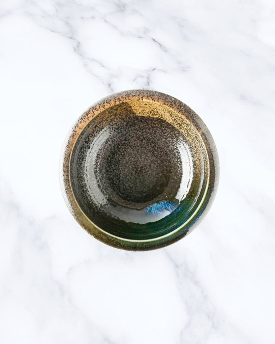 Side bowl made from Japanese ceramic, suitable for serving individual side dishes including desserts and rice portions.
