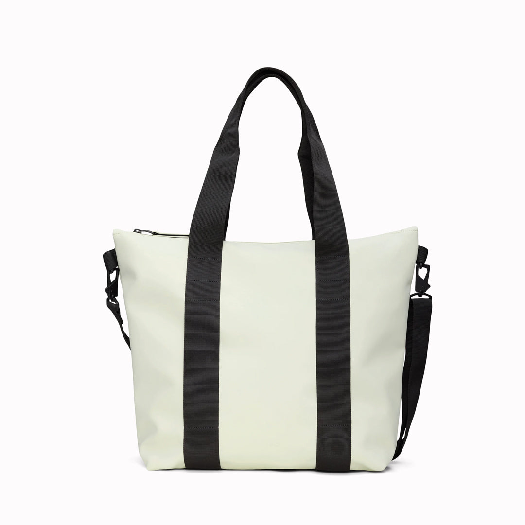 Rains' Tote Bag Mini W3 in new season fashion colour Daze is a waterproof tote bag and a great companion for shopping trips as well as commuting to the office.