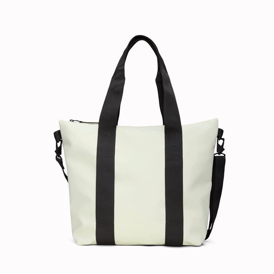 Rains' Tote Bag Mini W3 in new season fashion colour Daze is a waterproof tote bag and a great companion for shopping trips as well as commuting to the office.