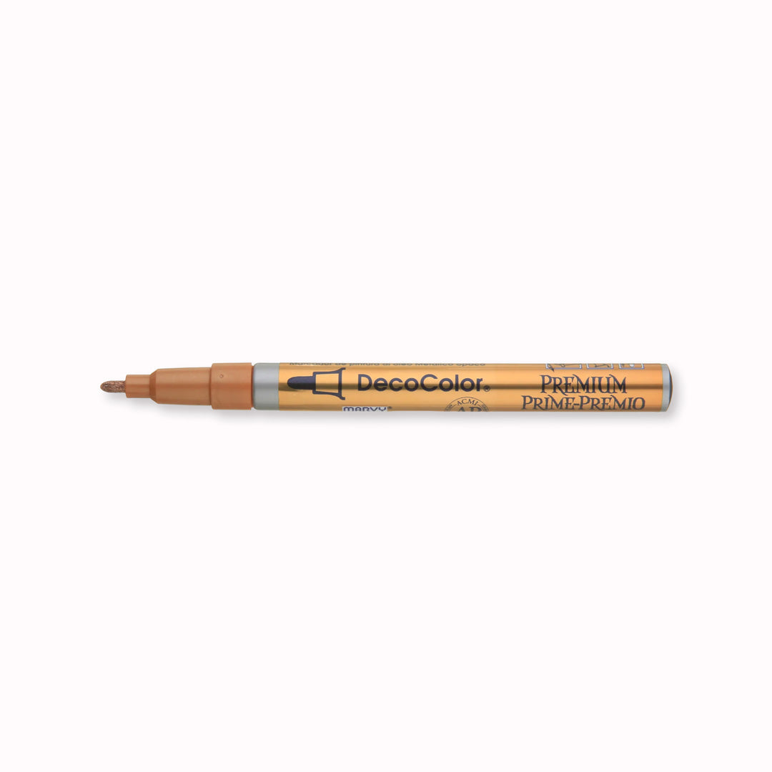 Marvy Uchida make a metallic calligraphy pen that produces a rich metallic finish with maximum opacity. With a Fine Bullet point nib, you can use them indoors or outside. It can be applied to most objects like, wood, metal, ceramic, glass, paper mache, sealed plaster, most plastics, most fabrics, and wicker.