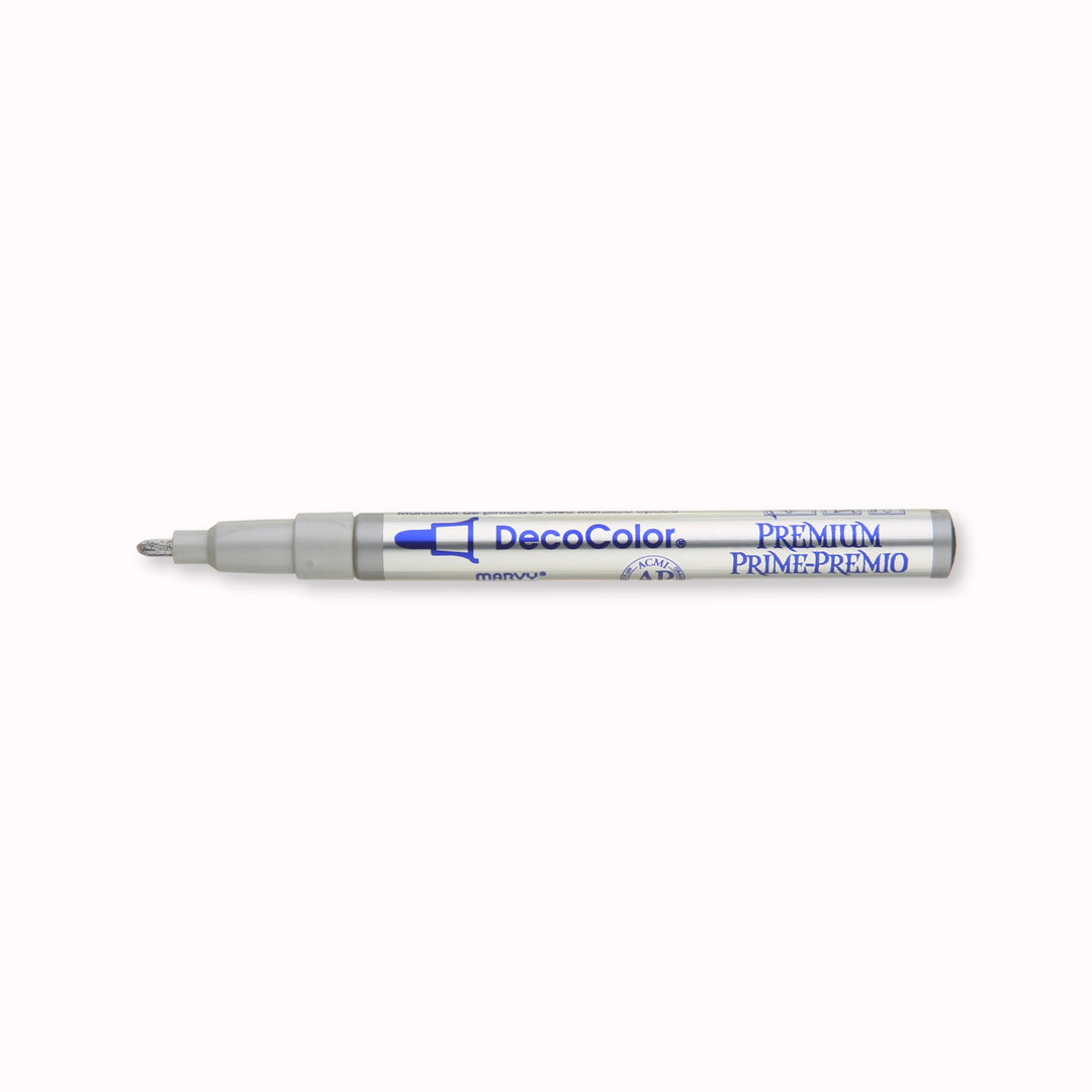 Marvy Uchida make a metallic calligraphy pen that produces a rich metallic finish with maximum opacity. With a Fine Bullet point nib, you can use them indoors or outside. It can be applied to most objects like, wood, metal, ceramic, glass, paper mache, sealed plaster, most plastics, most fabrics, and wicker.