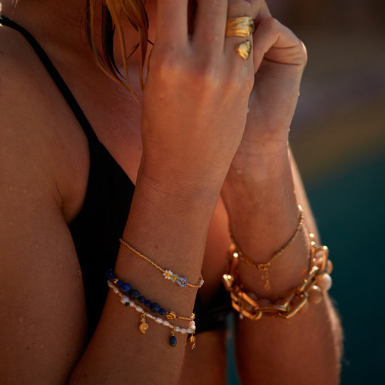 Lifestyle as Worn - DEEP BLUE captures a quieter kind of glamour. Still, confident and endlessly wearable — where depth meets ease.