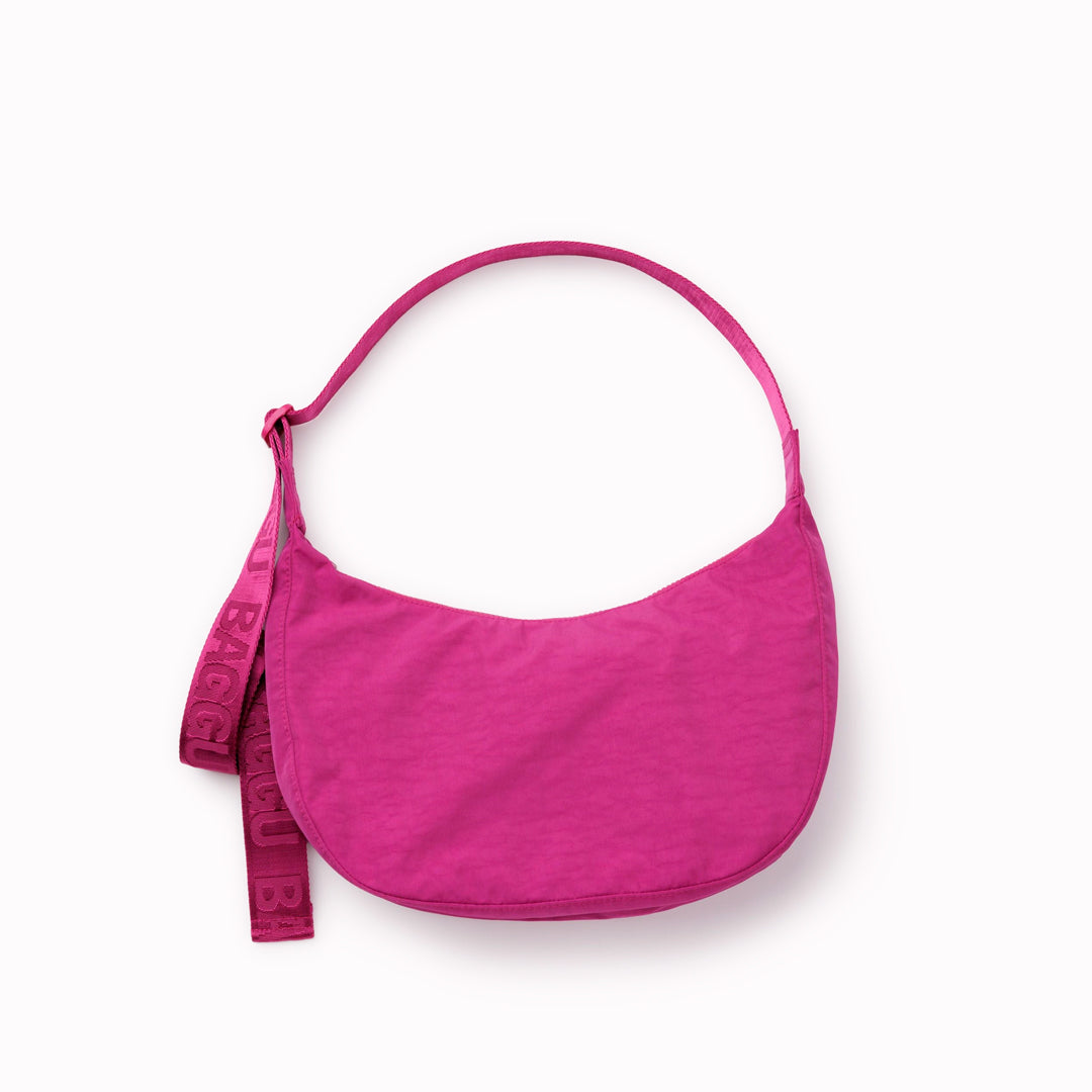Made from recycled heavyweight nylon with a ripstop lining, it holds its form while staying lightweight. 