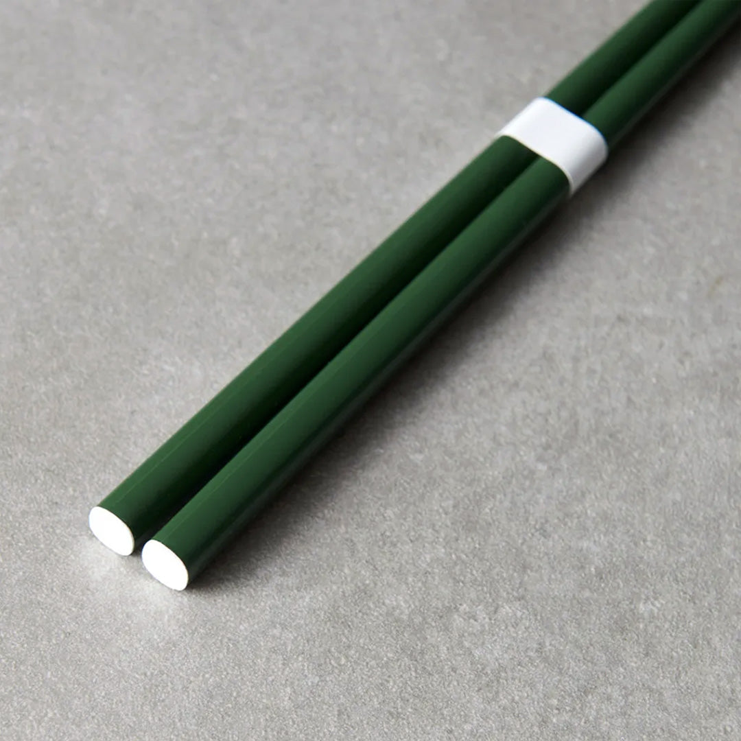 Deep Green lacquerware finish with white accent chopsticks from Made in Japan. This Chopstick collection is designed and made at the Zumi workshop in Fukui prefecture, Japan. 