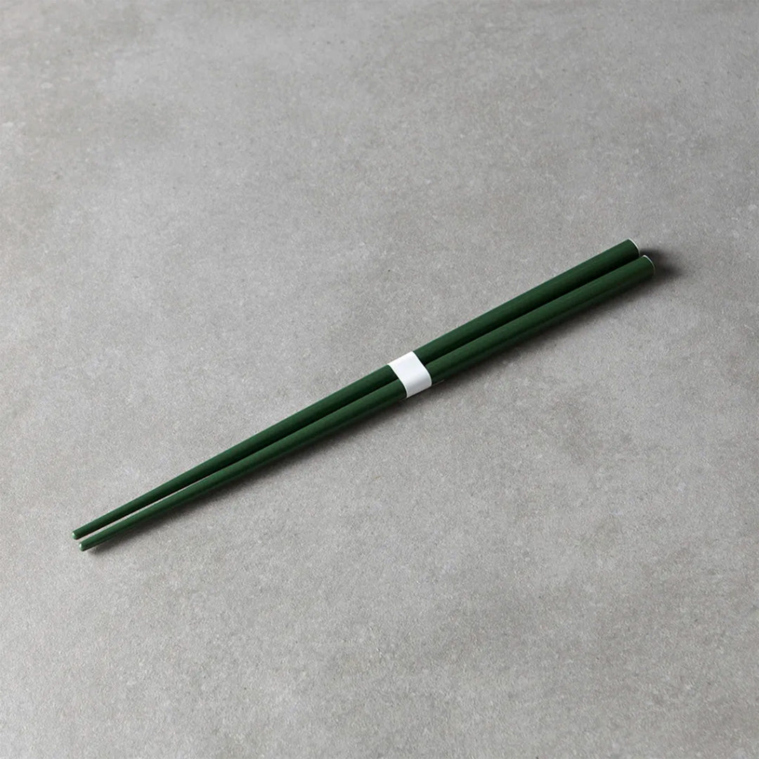 Deep Green lacquerware finish with white accent chopsticks from Made in Japan. This Chopstick collection is designed and made at the Zumi workshop in Fukui prefecture, Japan. 