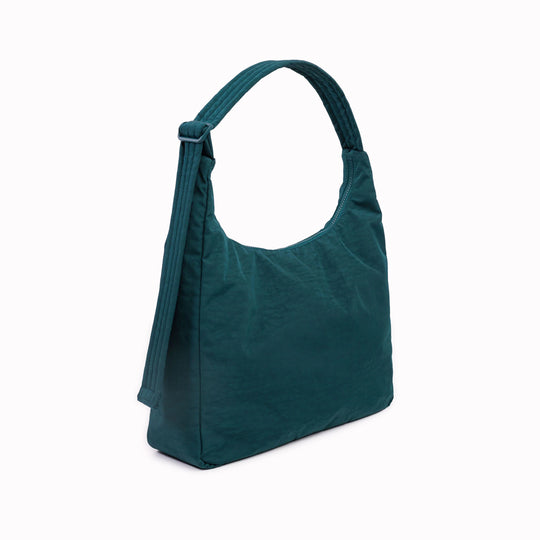 Practical shoulder bag designed for daily use and urban mobility. Crafted from recycled heavyweight nylon with a recycled ripstop lining