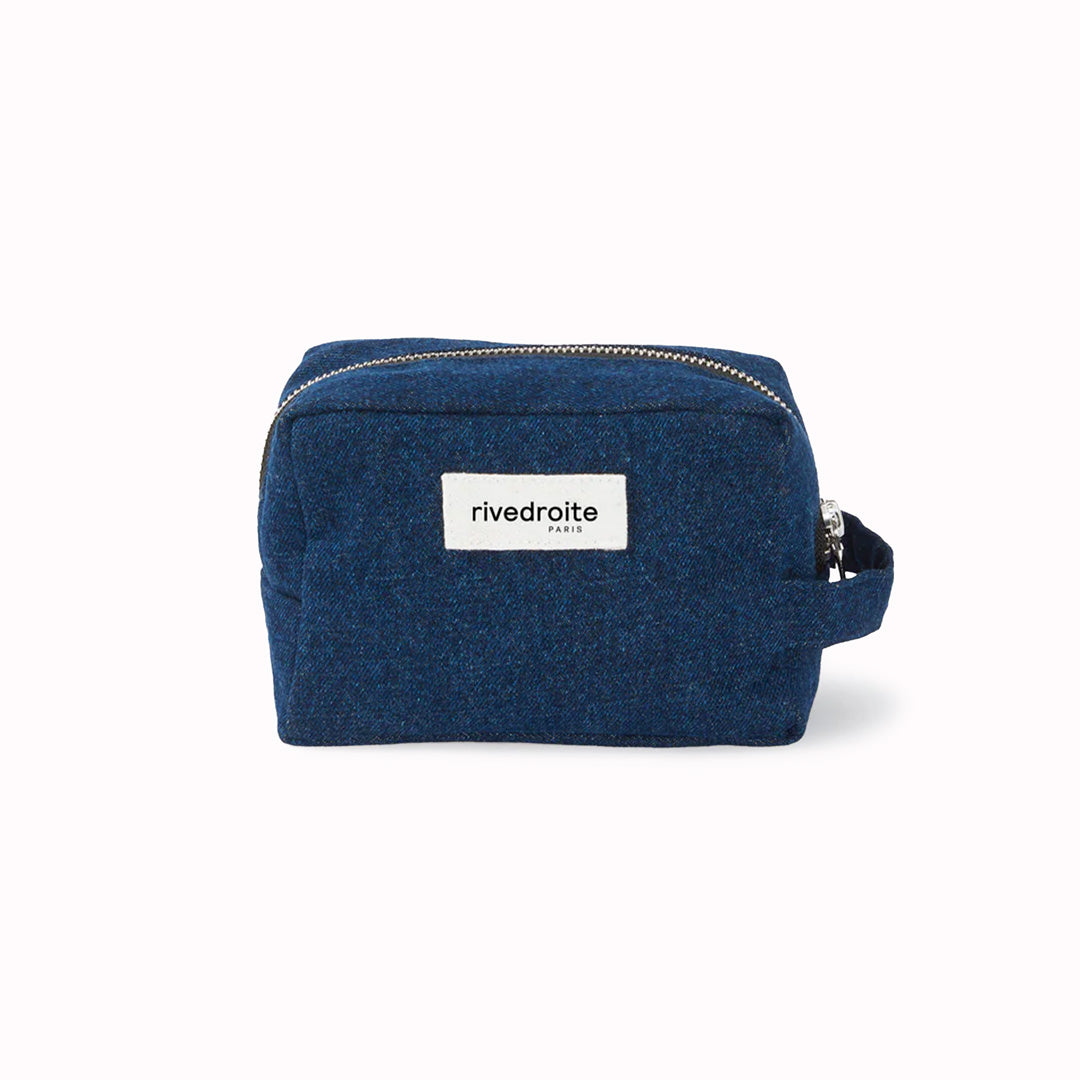 Raw Denim Tournelles bag from Parisian brand Rive Droite is a compact everyday toiletry make up bag made from up-cycled denim.