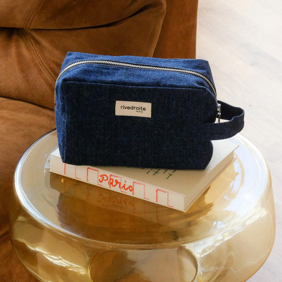 Denim Tournelles XL, A zippered pouch in a pleasing cube shape which is large enough for essential make up items on a weekend away.  Lifestyle Image