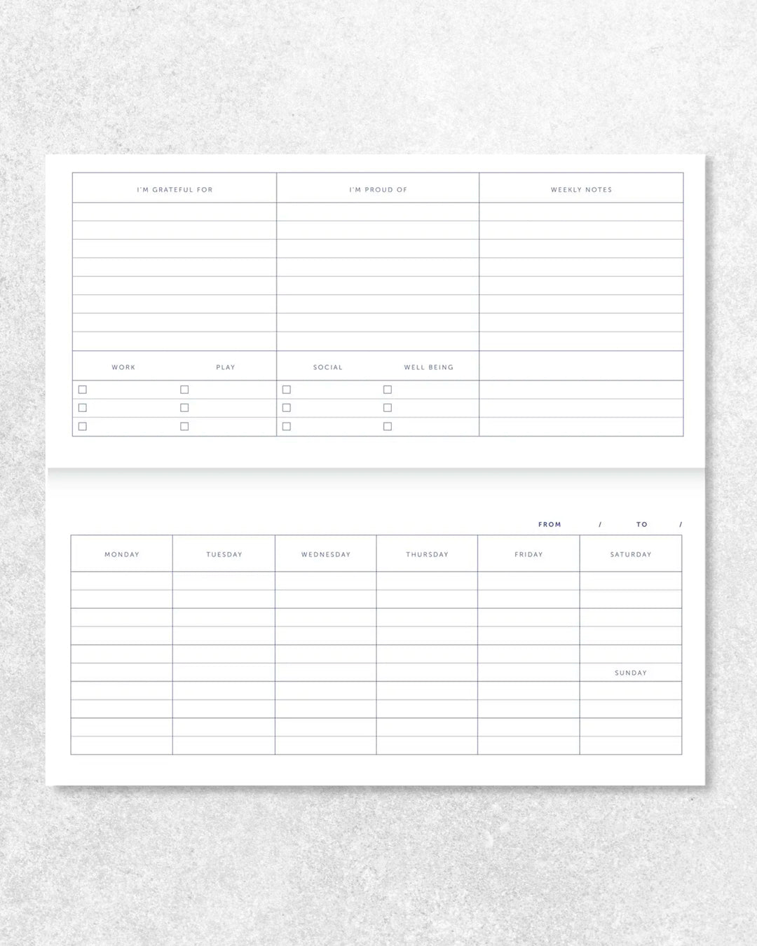 This undated weekly planner from A Journal is built as a wire-bound pad, with a clean, structured layout across each spread. The week sits clearly in view, with adjacent space left open rather than over-defined.