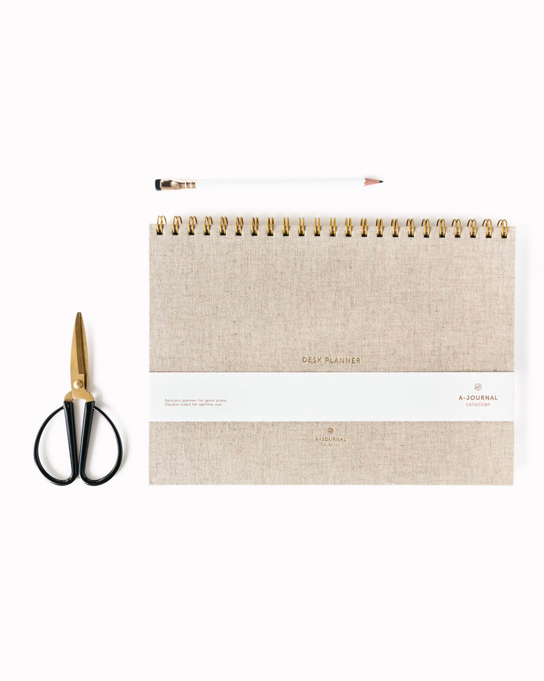 A desk planner built around a single weekly view, set in a structured A4-format page. The layout keeps everything visible at once — days, lists, and space to reset each week — without adding sections that compete for attention.