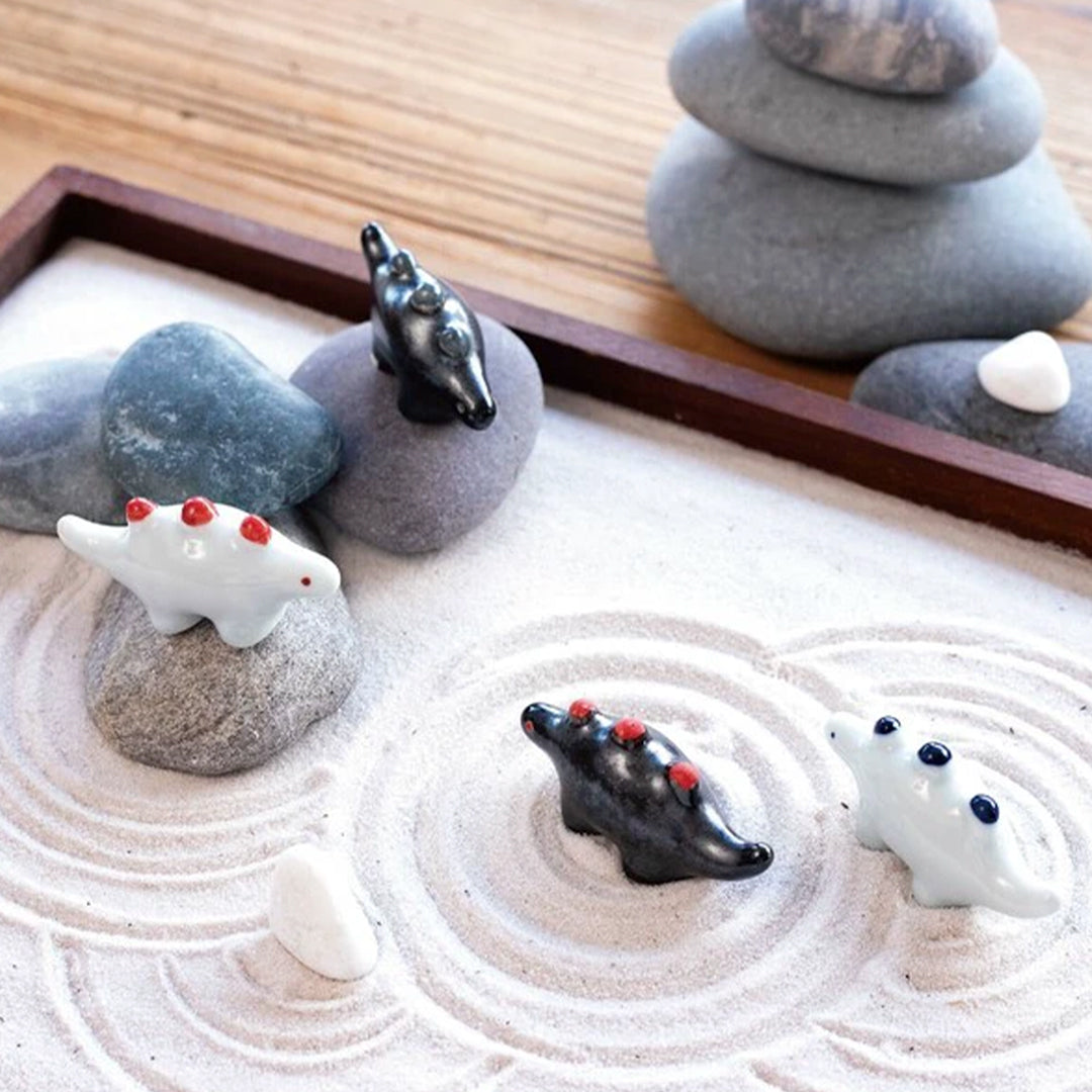 Dinosaur shaped chopstick rest made from 'Minoyaki' porcelain, fired at a high temperature and hand finished in Gifu prefecture, Japan.