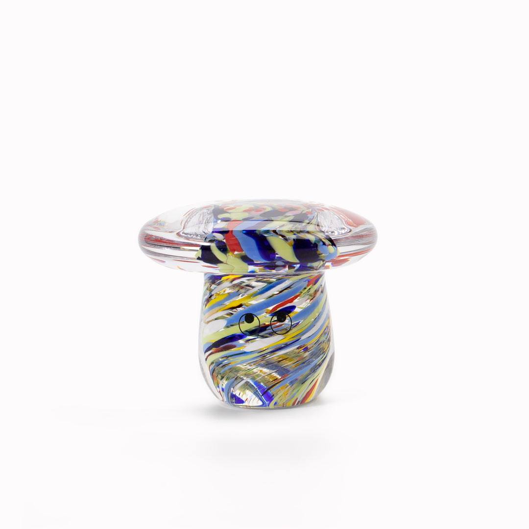 Shroom Crystal Blob is formed by dipping and/or rolling molten (hot!) clear glass into smaller chunks of brightly coloured glass droplets, then expertly shaping into weird and wonderful forms.