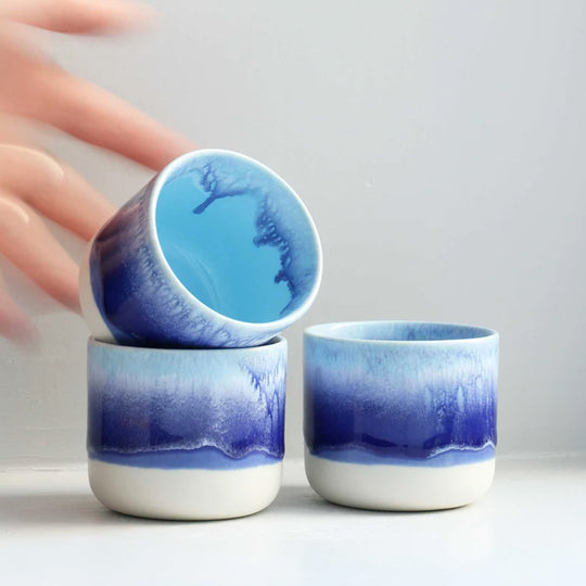 The Blue Hued Dolphin Blue - Danish/Japanese mix up with this thick glazed, hand made ceramic small beaker from Studio Arhoj's Tokyo Series. Can be used as a drinking vessel for espresso or a morning juice or as a small succulent planter (or simply beautifully ornamental.)