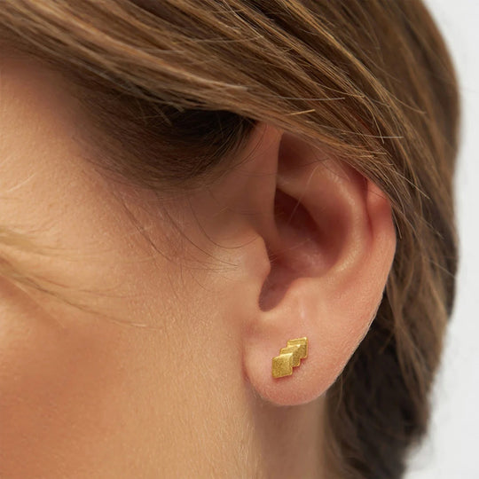 Detail of Gold Plated Domino 3 is made to mix and match with the other earrings in LULU Copenhagen's cute and playful range.