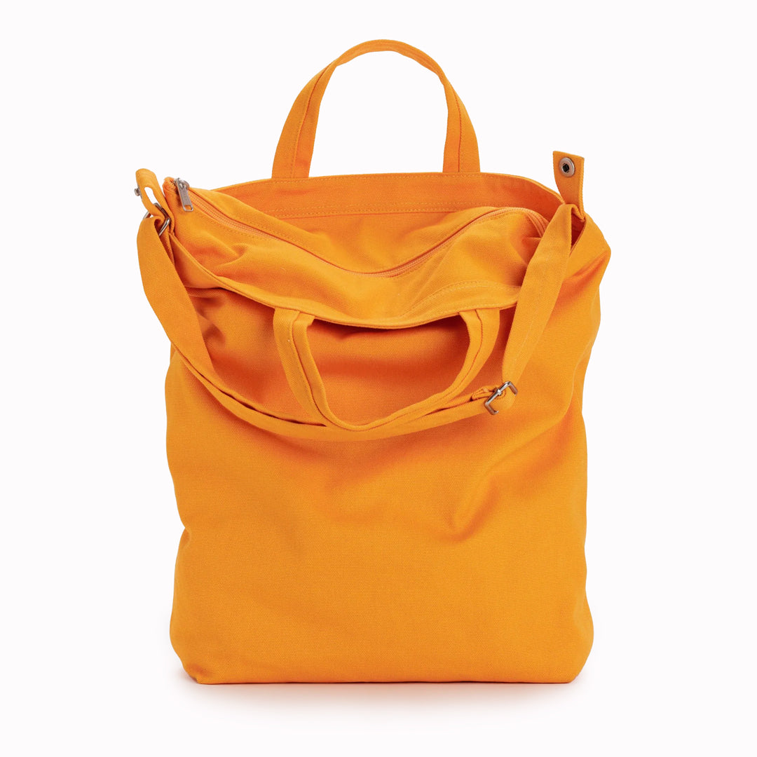 A bright and cheerful Tangerine Shopper - perfect everyday bag from Baggu for toting your laptop, yoga clothes, LPs or art supplies.