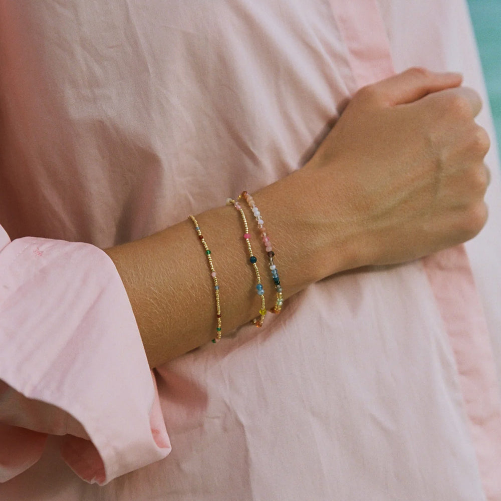 This bracelet will make you dream of early cloudy mornings on your way to the beach after a fun night out.  Crafted in brass with 18-karat gold plating + e coating