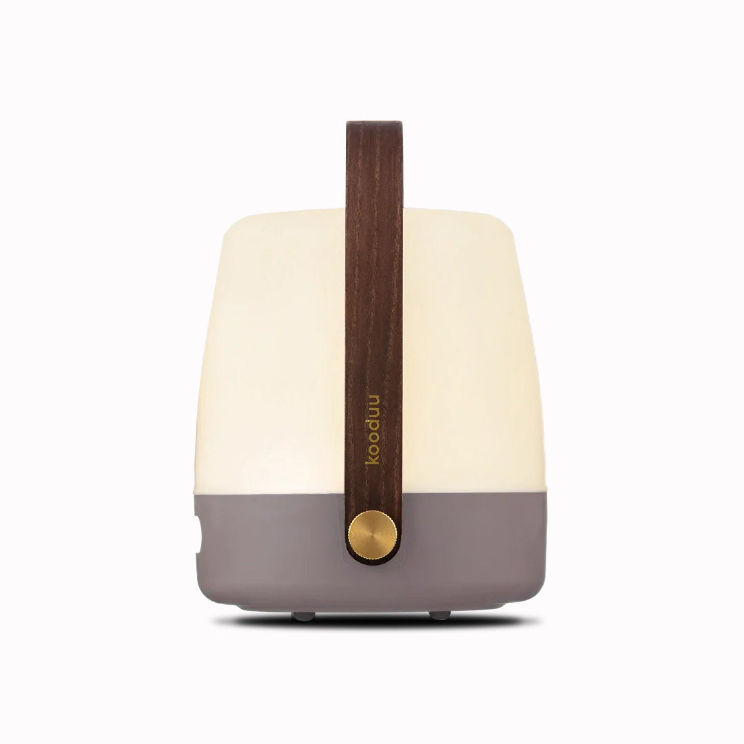 The Lite-Up in Earth from Kooduu is a battery operated portable light with a pleasing wooden carry handle and Scandinavian interior feel.
