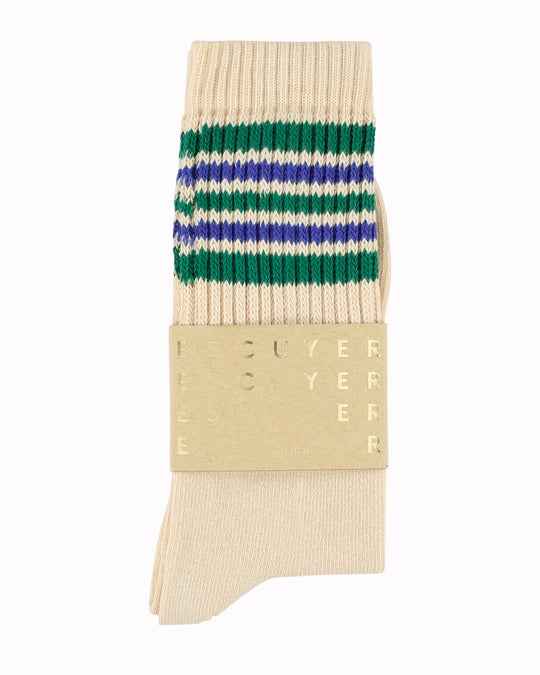 A classic crew sock with a five stripe design in blue and green on an ecru base - a look drawing on vintage athletic styles.
