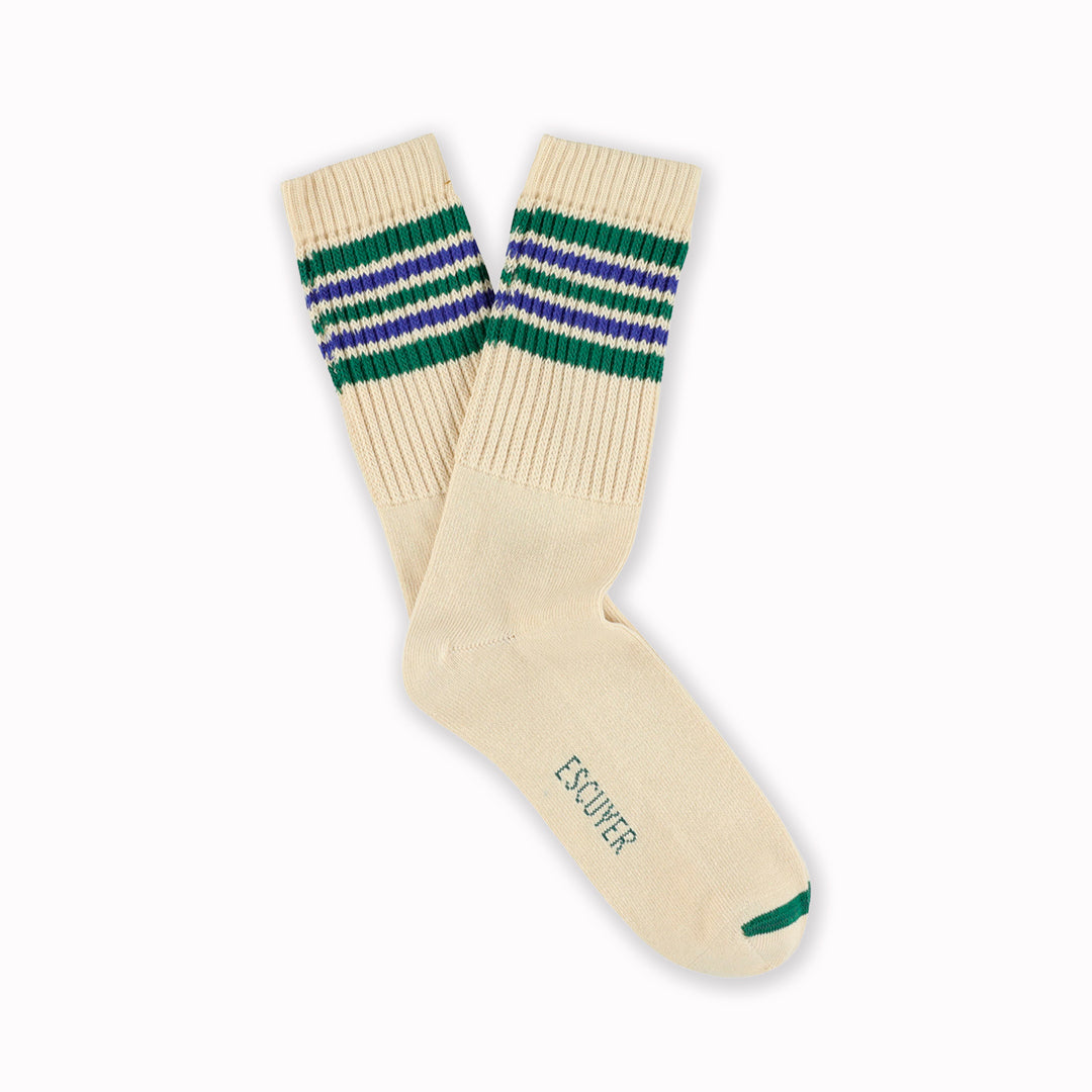 A classic crew sock with a five stripe design in blue and green on an ecru base - a look drawing on vintage athletic styles.
