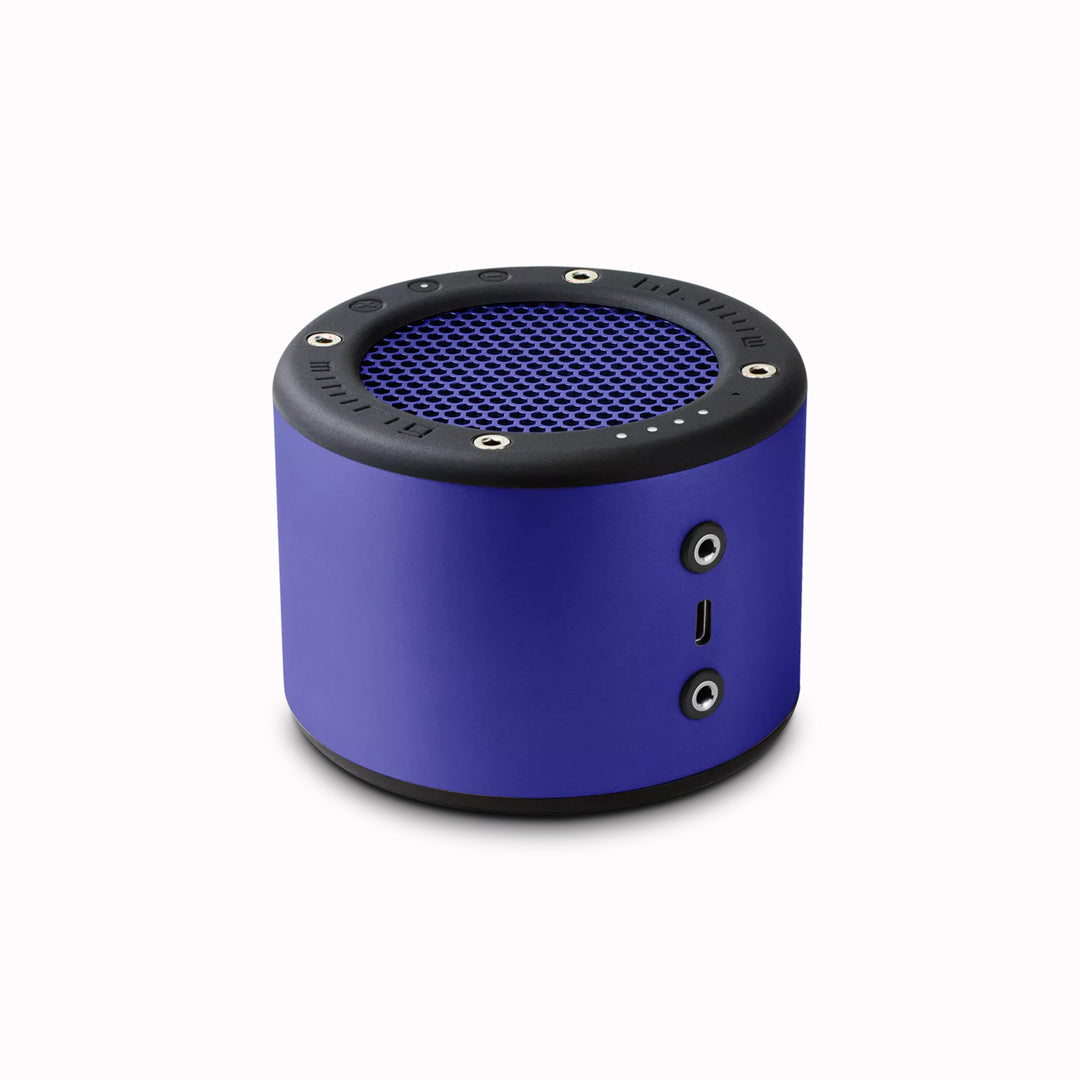 The Minirig Mini 4 in Electric Blue is a portable Bluetooth speaker that represents the latest innovation in audio technology. Crafted in Bristol, UK, this speaker is the result of over a decade of design evolution, offering a robust anodized aluminium and high-impact ABS construction.