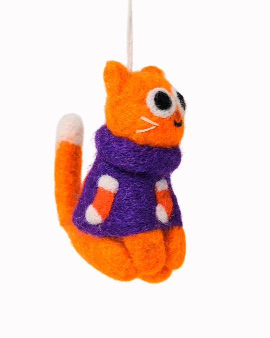 Esther the cat loves their festive Christmas jumper! She is a playful felted Christmas tree decoration designed by Elliot Kruszynski.Esther the cat loves their festive Christmas jumper! She is a playful felted Christmas tree decoration designed by Elliot Kruszynski.
