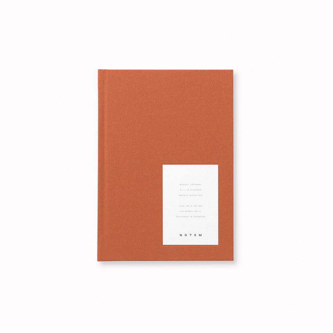 Notem Even Weekly Journal, This A6 Sienna journal has 160 pages of high-quality uncoated lined paper with dates on the left and notes on the right hand side, it also has a Ribbon Marker.