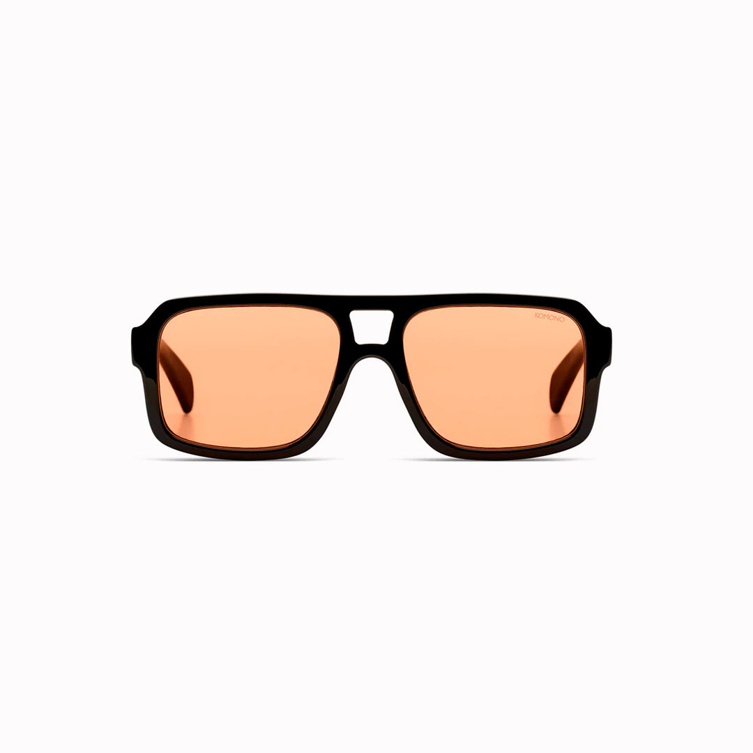 The Falcon strips things back to a slim rectangular frame with a lighter, sharper profile than KOMONO’s heavier acetate styles.