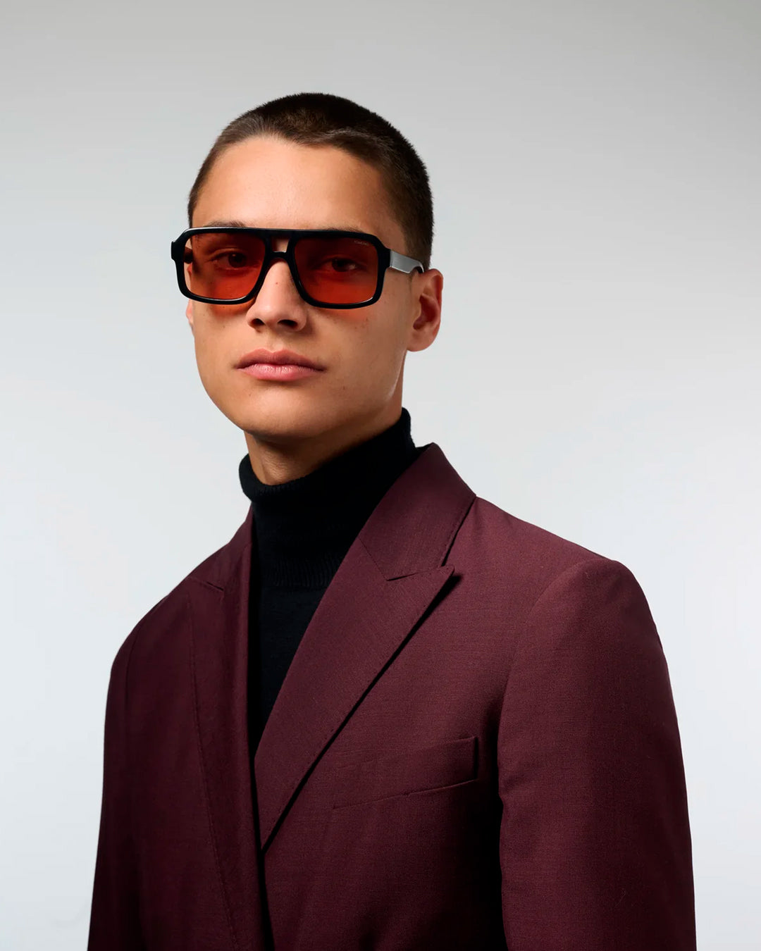The Falcon strips things back to a slim rectangular frame with a lighter, sharper profile than KOMONO’s heavier acetate styles.