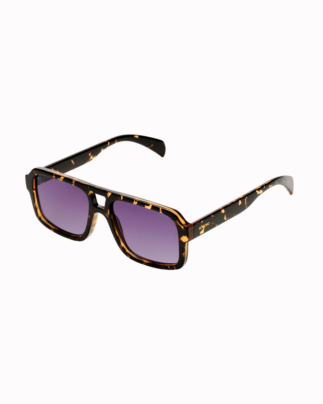 The Falcon strips things back to a slim rectangular frame with a lighter, sharper profile than KOMONO’s heavier acetate styles.