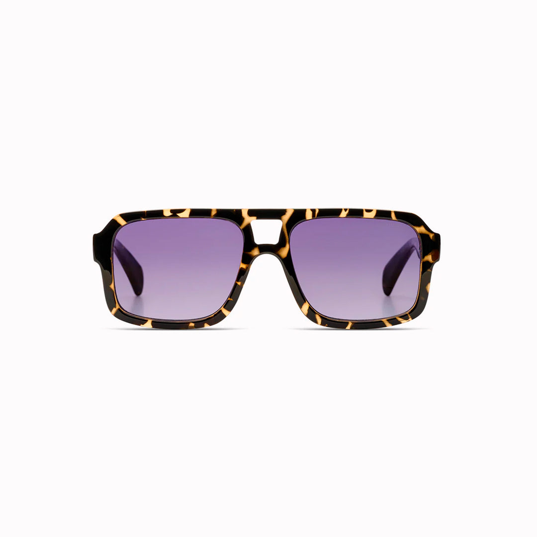 The Falcon strips things back to a slim rectangular frame with a lighter, sharper profile than KOMONO’s heavier acetate styles.