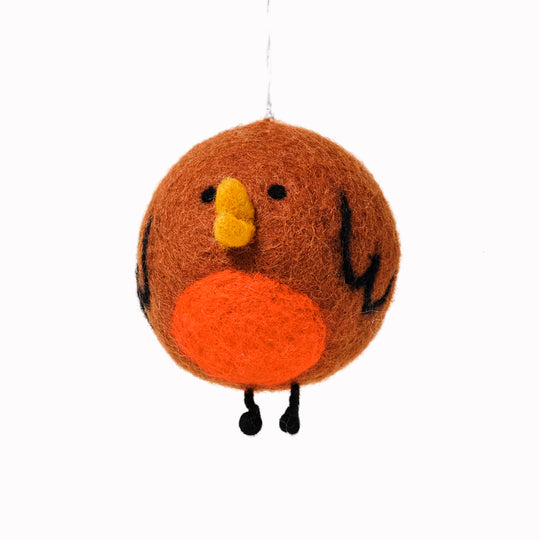 A cute and chirpy interpretation of the classic Red Robin at Christmas, a playful felted festive tree decoration designed by Holly St Clair.