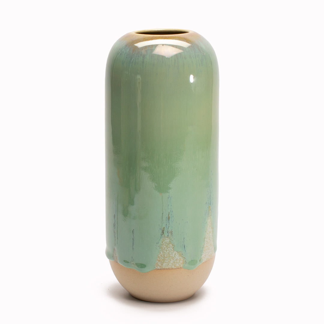 Finland Forest is a vibrant green Yuki Ceramic Vase <span data-mce-fragment="1">that is drip glazed and hand-thrown in watertight stoneware.</span>