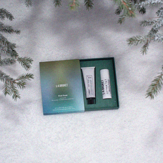 The L:A Bruket 2025 First Frost Winter Gift Kit contains their bestselling self care duo: Lemongrass hand cream 30ml and Original Almond &amp; Coconut Lip Balm 14g