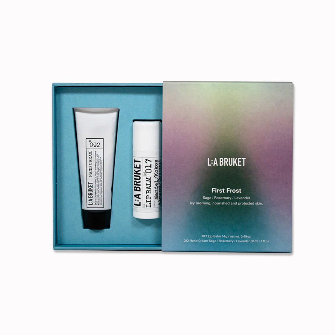 he L:A Bruket 2025 First Frost Winter Gift Kit contains their bestselling self care duo: 092 Sage Rosemary Lavender hand cream 30ml and&nbsp;Original Almond &amp; Coconut Lip Balm 14g