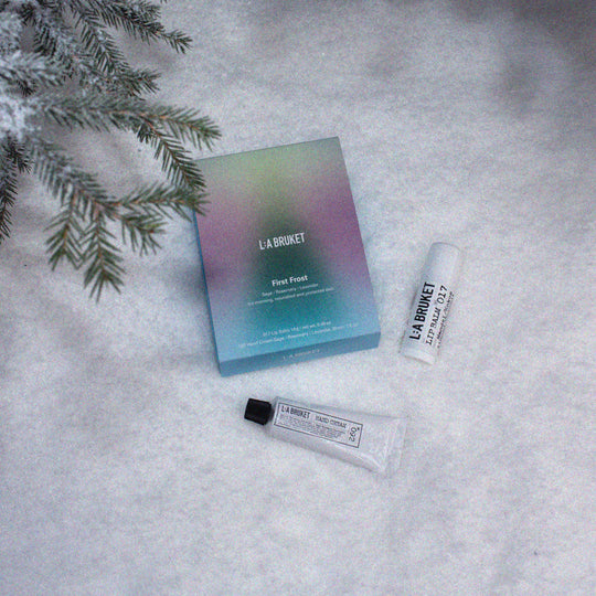 he L:A Bruket 2025 First Frost Winter Gift Kit contains their bestselling self care duo: 092 Sage Rosemary Lavender hand cream 30ml and&nbsp;Original Almond &amp; Coconut Lip Balm 14g