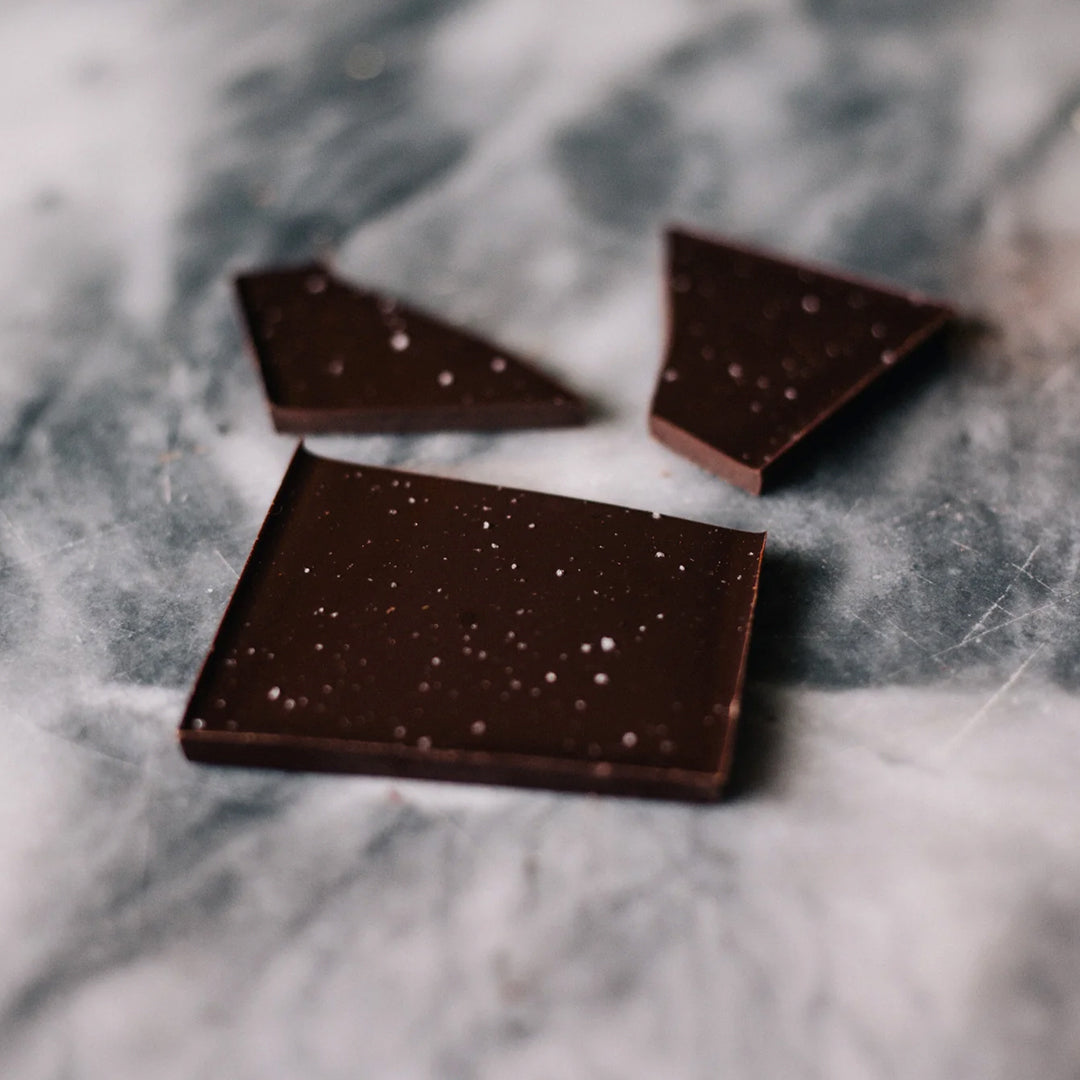 Single-origin 73%&nbsp;dark chocolate finished with delicate fleur de sel for a balanced sweet-salty craft chocolate bar.
