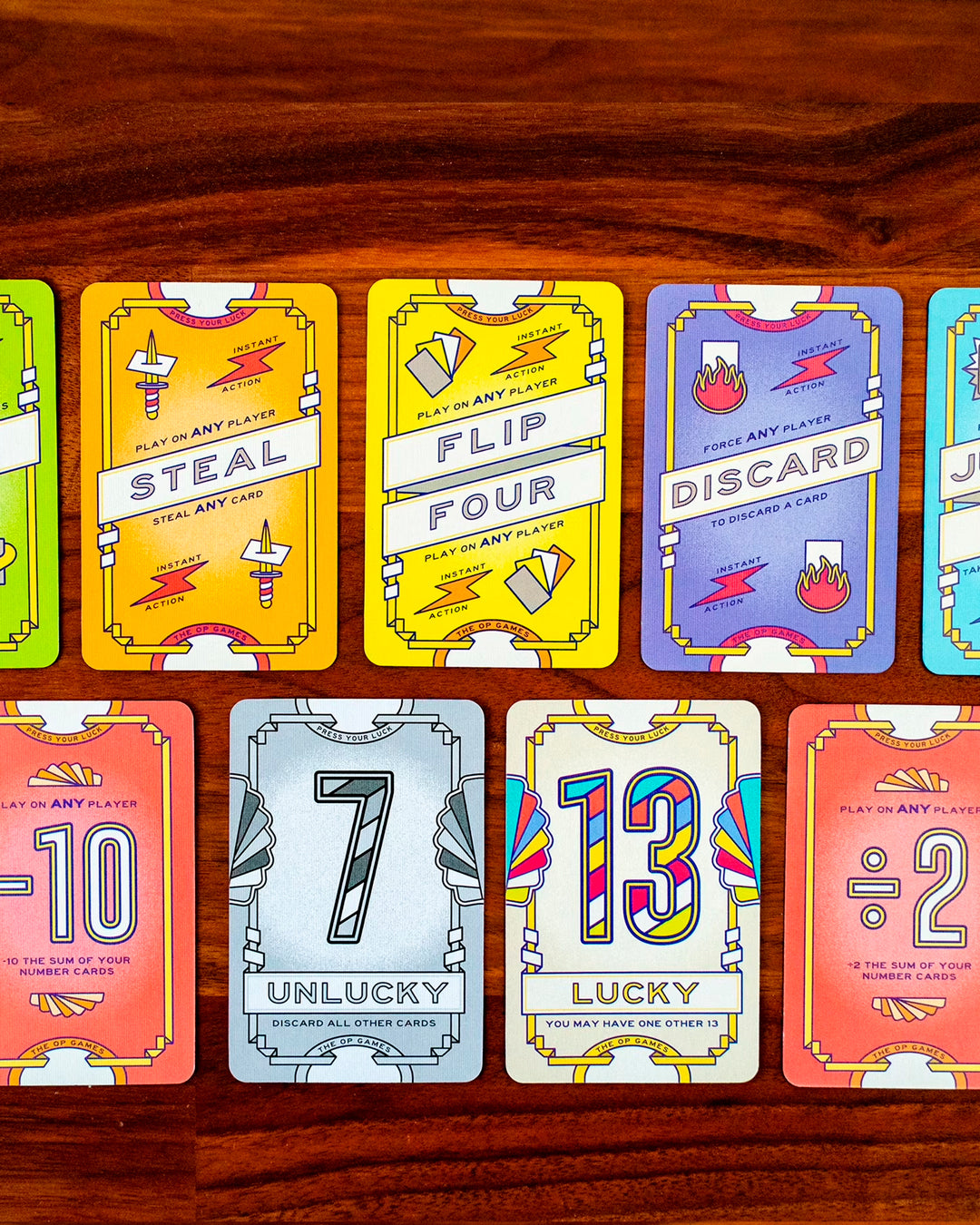 A standalone sequel to Flip 7, built around the same push-your-luck structure but with a sharper edge.