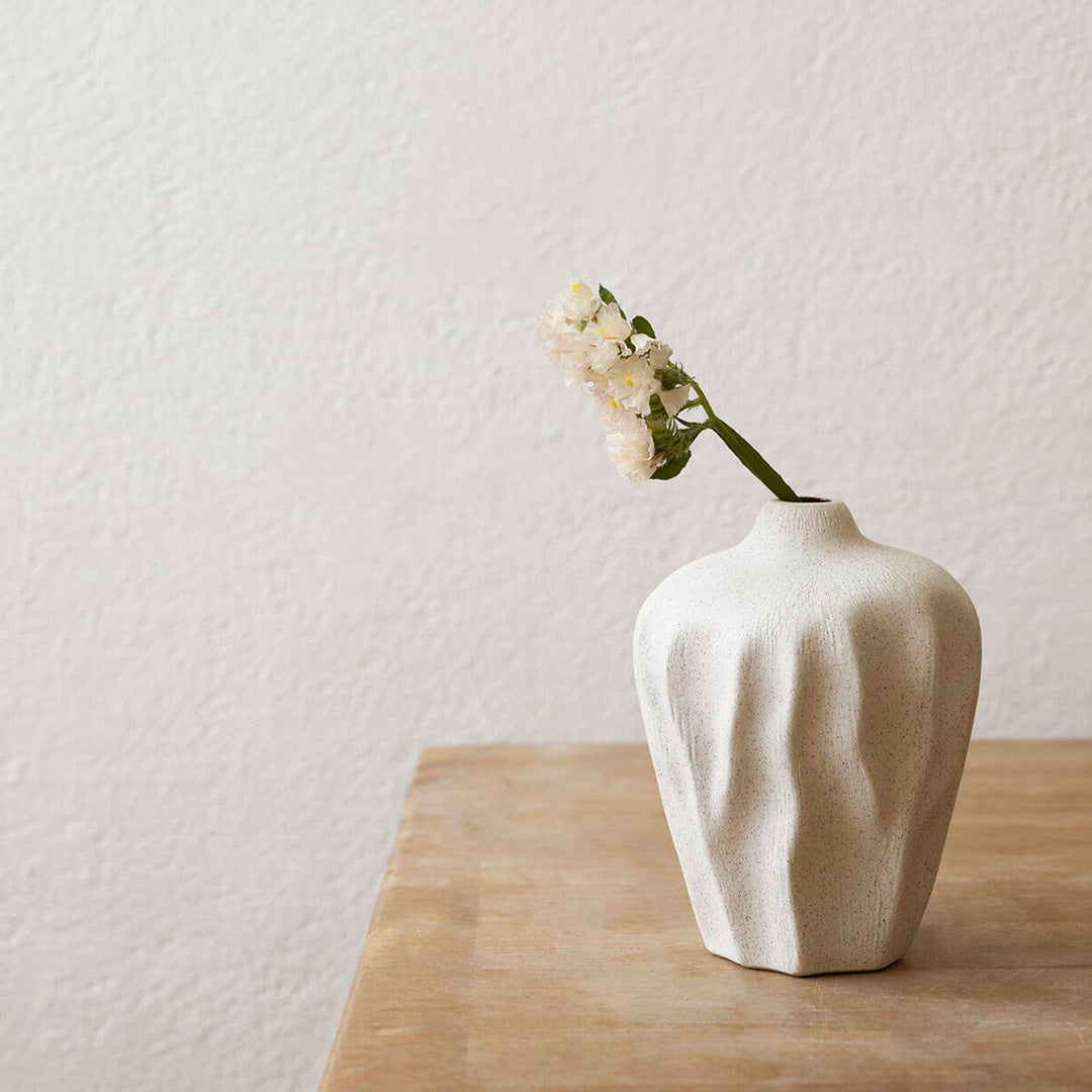 Flower Seed ceramic vase from Lindform - seen on table with flower