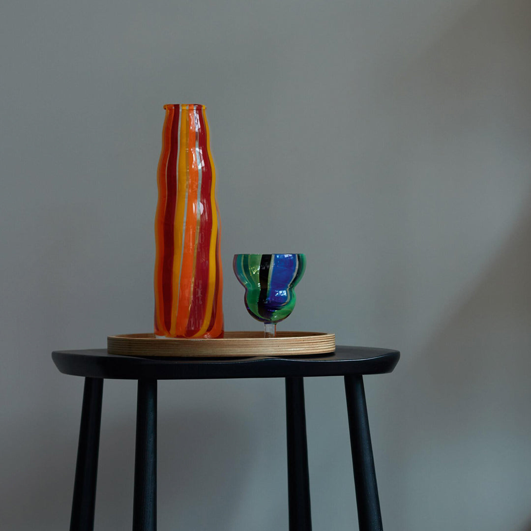 Part of the LSA International Folk Collection, this tall and slender glass Folk Vase has been hand painted with Orange, Red and Yellow stripes for bright and bold impact.&nbsp;