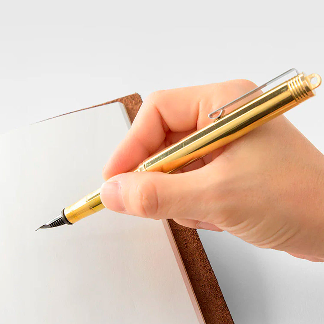 The untreated brass body will gradually develop a unique patina, picking up marks and tone from regular use.